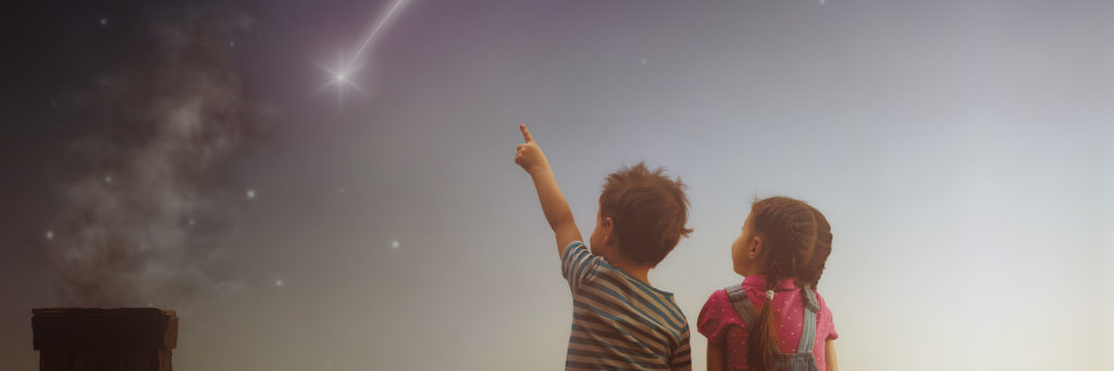 Children gazing at stars